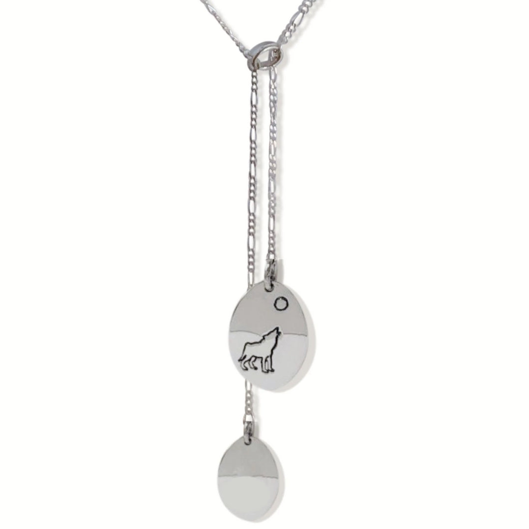 Sterling silver dangling oval necklace with Canadian symbols.  Wolf symbol pictured here.