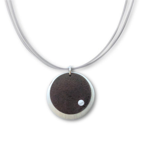 Vintage Round Necklace featuring recycled vintage round tin riveted onto a round pewter layer.